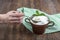 Water buffalo yogurt fermented in copper bowl. Homemade Yogurt in bowl on wooden table, top view, copy space. Organic plain greek