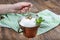 Water buffalo yogurt fermented in copper bowl. Homemade Yogurt in bowl on wooden table, top view, copy space. Organic plain greek