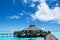 Water bungalows and blue ocean and sunny sky