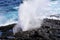 Water bursts through blowhole on Espanola Island, Galapagos National park, Ecuador