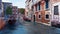 Water canal and ancient buildings in Venice, Italy