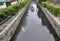 Water Canal inland the front Garden of Higashi Honganji Temple in Kyoto City in Japan