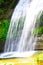 Water Cascade Falls From High Wall. Most beautiful and greatest waterfalls in Khagrachhari, Bangladesh name Richang waterfall.