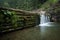 Water cascade by historic watermill Oblazy, Kvacianska dolina, Slovakia