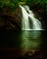 Water cascades over Blue Hole Falls in Hiawassee, Georgia.