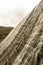 Water cascading down stone dam, Ladybower reservoir.