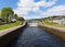 Water cascading through lock gates on the Caledonian Canal Fort Augustus Scotland uk