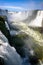 Water cascading over the dramatic Iguacu falls in Brazil