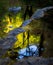 Water cascading over mossy rocks in the mountains