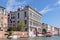 Water channels of Venice city. Facades of residential buildings overlooking the Grand Canal in Venice, Italy.