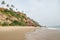 Water at the cliff of Varkala along the coast with volcanic stones, India