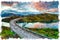 Water color painting of sunrise over Kylesku Bridge in the Highlands of Scotland