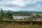 Water dam against a mountain background, Aberdare Ranges, Kenya