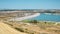 Water dam Asprokremmos in desert field countryside in Cyprus. Aerial view reservoir barrage