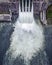 water discharge stream waterfall at the hydroelectric dam. an overflowing reservoir, a huge jet of water, aerial , a