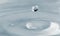 Water drop and splash background, small impact causes big changes. Ripple, macro wave on surface of liquid