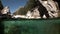 Water droplets on the glass video cameras of operator in river Verzasca.