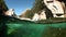 Water droplets on the glass video cameras of operator in river Verzasca.