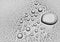 Water droplets on a gray waterproof surface