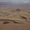 water droplets on a surface. sand ripples in the sand. sand texture background