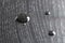 Water droplets on wooden surface