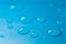 water drops on a blue background .Fluid texture in cold blue tones.macro drops set