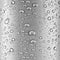 Water drops over gray glass.
