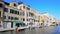 Water excursion in Venice, view on wonderful colorful buildings and boats