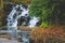 Water fall rock cascade motion blur in fall season