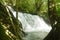 water falling on river pass rock and stone at north Chet Kod waterfall in Thailand