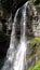 Water falls from a cliff in slow motion