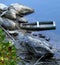 Water filled riverbank boat