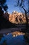 Water Filled Tarn Reflects High Mountains Zion National Park