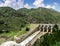 Water flow of the Pandoh Dam on the Beas River in Mandi district of Himachal Pradesh, India.