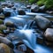 Water flowing over river rocks by