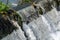 Water flowing over a river weir