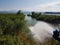 Water flowing from pipe water waste in ioannina lake