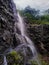 Water flowing from rocky cliff