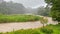 Water flowing in Sarapiqui River in the rain in Costa Rica