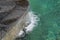 Water flows down from the marble fountain ledge