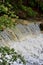 Water flows down a swiftly moving brook upstream from Wentworth Falls