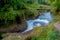 Water flows downstream to Devi`s Falls in Pokhara, Nepal