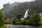 Water from the Fosselva river drops down the 50 m high powerful Steindalsfossen