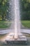 Water fountain in park. Splashing streams of fountain in Water s