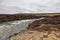 Water of the Godafoss Waterfall - beautiful part of stony rocky