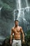 Water. Healthy Man With Body Near Waterfall. Healthcare