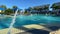 Water jets flowing into a resort swimming pool with audio in Orlando, Florida
