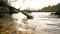 Water level clip of lake surrounded by trees in Autumn or Fall