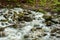 Water masses of an underground river coming out of the earth