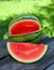 Water melon on wooden garden table